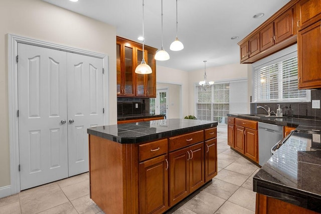7111 River Run Dr, Chattanooga, TN 37416 - kitchen featuring a sink, tile counters, stainless steel dishwasher, a kitchen island, and light tile patterned flooring