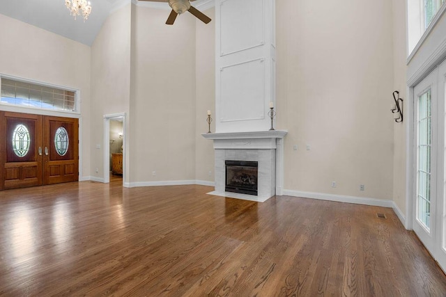 7111 River Run Dr, Chattanooga, TN 37416 - entryway with baseboards, a high ceiling, wood finished floors, and a fireplace