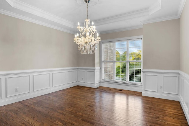7111 River Run Dr, Chattanooga, TN 37416 - spare room featuring dark wood-type flooring, a notable chandelier, a tray ceiling, and a wainscoted wall