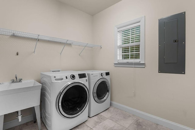 7111 River Run Dr, Chattanooga, TN 37416 - laundry room featuring separate washer and dryer, baseboards, electric panel, laundry area, and a sink