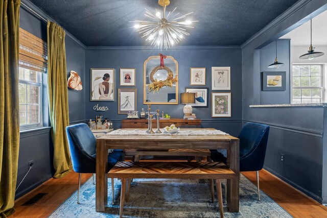 1905 Bella Vista Dr, Chattanooga, TN 37421 - dining area with a chandelier, wood finished floors, ornamental molding, and baseboards