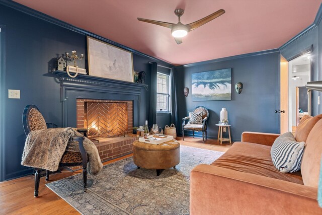 1905 Bella Vista Dr, Chattanooga, TN 37421 - living room with a brick fireplace, ornamental molding, ceiling fan, and wood finished floors