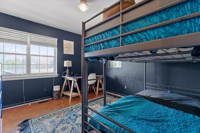 1905 Bella Vista Dr, Chattanooga, TN 37421 - bedroom with wood finished floors, multiple windows, and a desk
