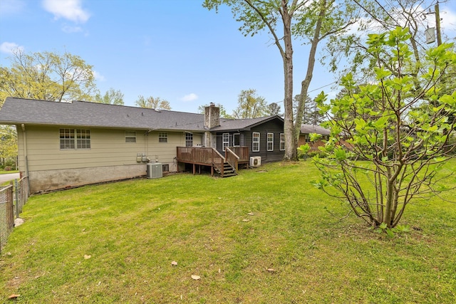 1905 Bella Vista Dr, Chattanooga, TN 37421 - back of property with a wooden deck and a chimney