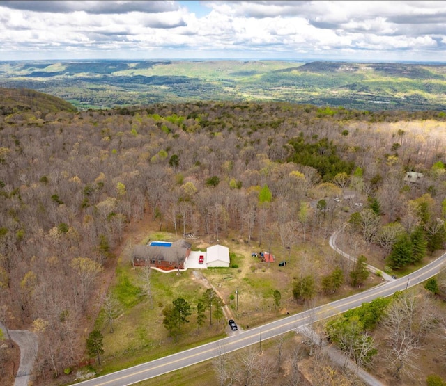 aerial view with a wooded view