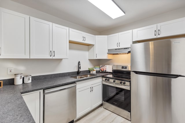 900 Mountain Creek Rd # R311, Chattanooga, TN 37405 - kitchen featuring appliances with stainless steel finishes, under cabinet range hood, and white cabinets