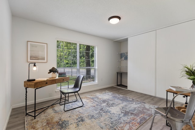 900 Mountain Creek Rd # R311, Chattanooga, TN 37405 - office area with wood finished floors and baseboards
