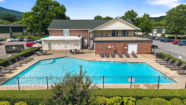 900 Mountain Creek Rd # R311, Chattanooga, TN 37405 - community pool featuring stairway, a patio, and a mountain view