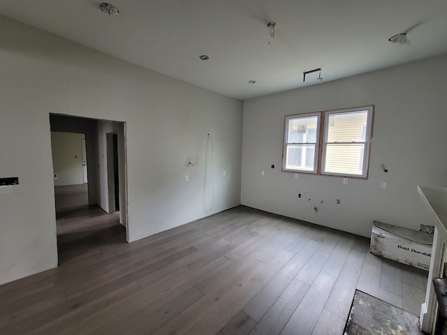 empty room featuring wood finished floors