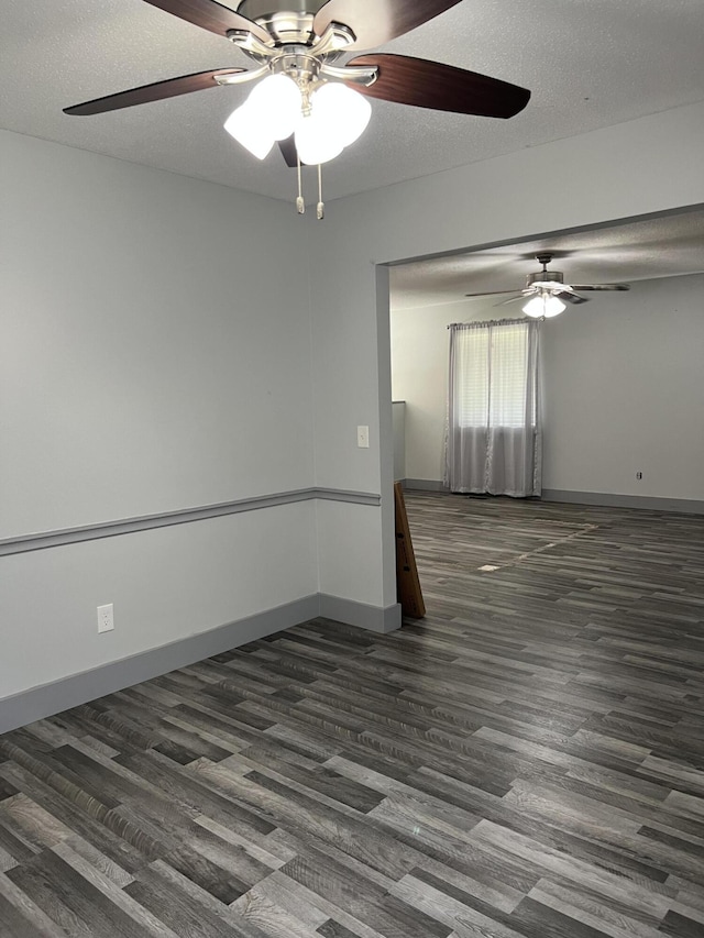 9121 Potomac Dr, Chattanooga, TN 37421 - spare room with ceiling fan, dark wood-style floors, baseboards, and a textured ceiling