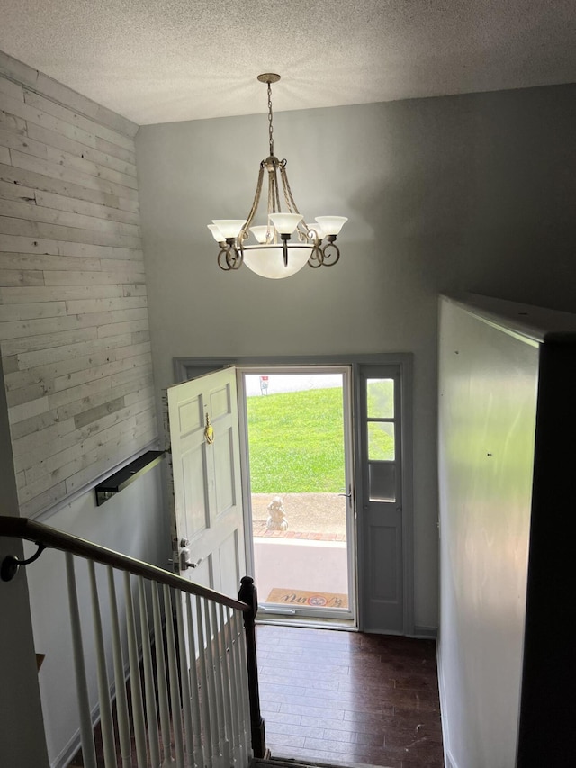 9121 Potomac Dr, Chattanooga, TN 37421 - entryway featuring a chandelier, a textured ceiling, and hardwood / wood-style floors