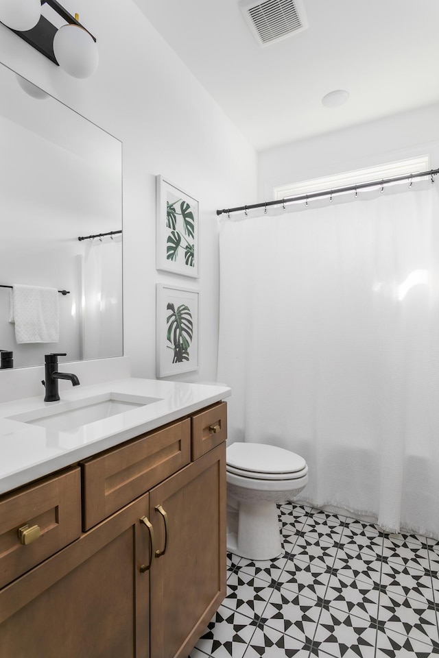 92 Lemonade St, Chattanooga, TN 37421 - bathroom with tile patterned floors and vanity