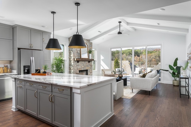 92 Lemonade St, Chattanooga, TN 37421 - kitchen featuring gray cabinets, stainless steel refrigerator with ice dispenser, open floor plan, a fireplace, and recessed lighting