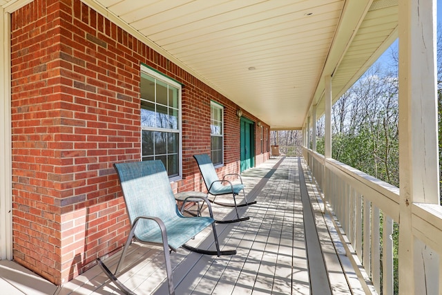 wooden deck featuring a porch