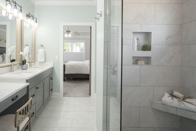 full bathroom with double vanity, ornamental molding, ensuite bath, marble finish floor, and a sink