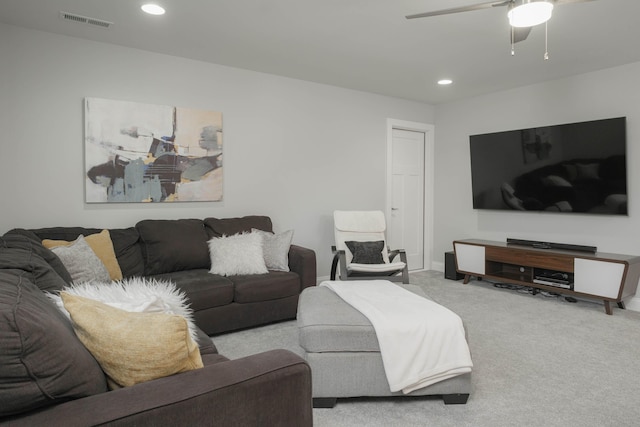 living room featuring recessed lighting, visible vents, ceiling fan, and carpet floors