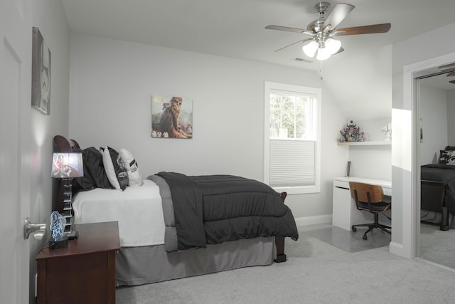 bedroom with light colored carpet, baseboards, a ceiling fan, and visible vents