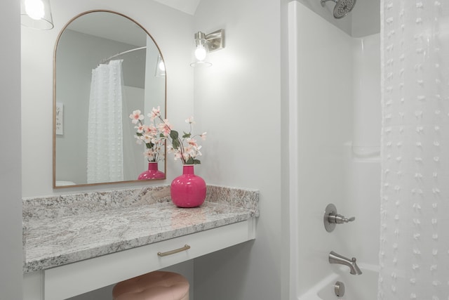 full bathroom featuring vanity and shower / bath combination with curtain