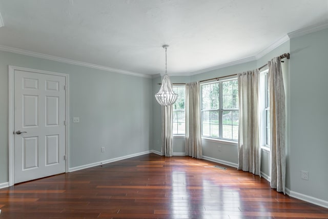 unfurnished dining area featuring crown molding, dark wood-type flooring, visible vents, a notable chandelier, and baseboards