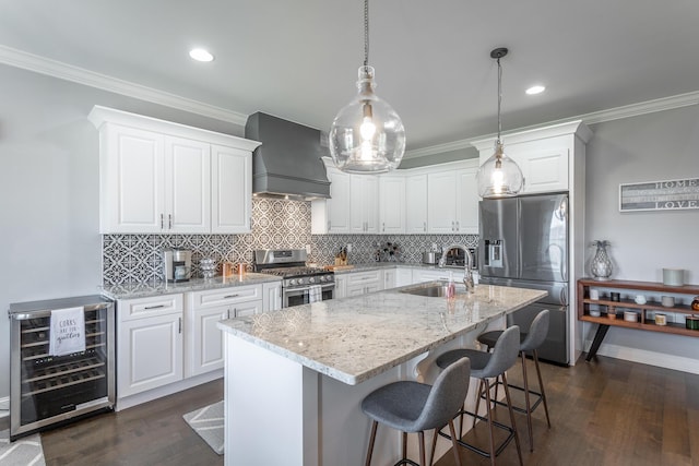 kitchen featuring crown molding, custom exhaust hood, a sink, stainless steel appliances, and wine cooler