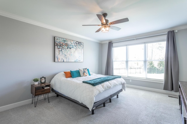 bedroom featuring a ceiling fan, baseboards, ornamental molding, and light colored carpet
