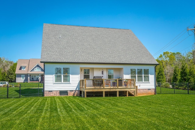 back of property featuring roof with shingles, a fenced backyard, a deck, a yard, and crawl space