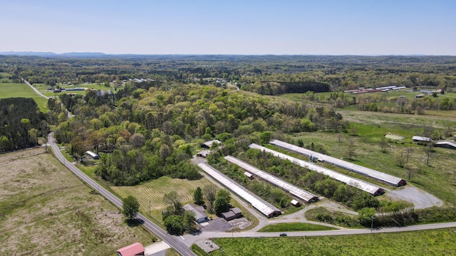 drone / aerial view with a rural view and a view of trees