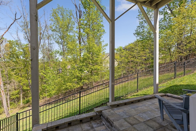 sunroom / solarium featuring plenty of natural light