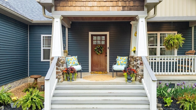property entrance featuring a porch