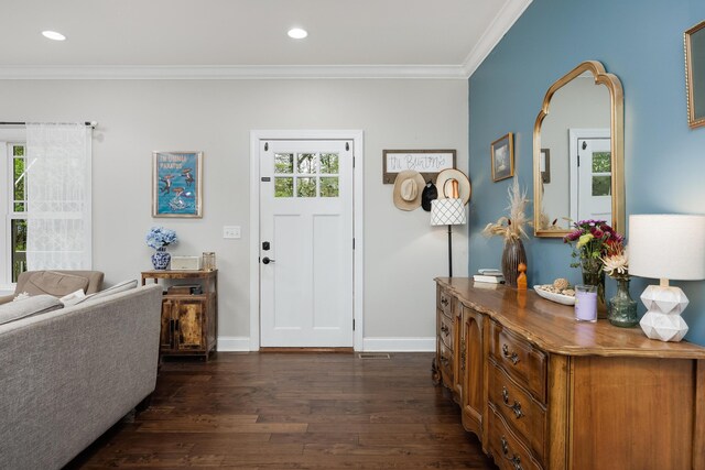 entrance foyer featuring recessed lighting, ornamental molding, dark wood finished floors, and baseboards