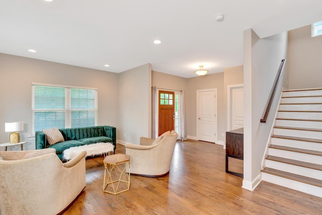 114 W 19th St, Chattanooga, TN 37408 - living room with light wood finished floors, stairs, baseboards, and recessed lighting