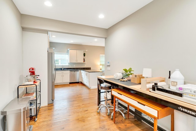 114 W 19th St, Chattanooga, TN 37408 - dining space featuring light wood finished floors and recessed lighting