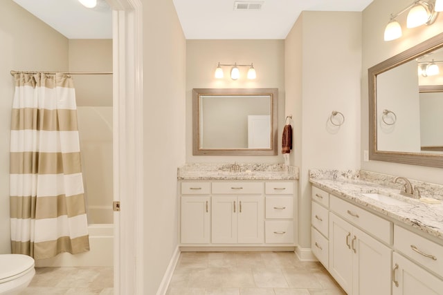 114 W 19th St, Chattanooga, TN 37408 - bathroom featuring a sink, toilet, two vanities, and shower / bath combo with shower curtain