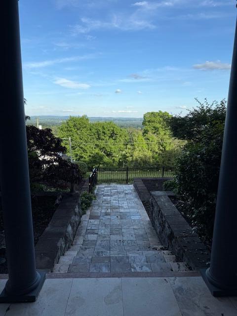 view of patio / terrace featuring fence