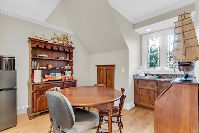 381 E View Dr, Chattanooga, TN 37404 - dining area with light wood-style flooring, crown molding, vaulted ceiling, and recessed lighting