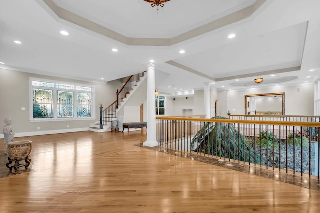 381 E View Dr, Chattanooga, TN 37404 - interior space with crown molding, a tray ceiling, wood finished floors, recessed lighting, and ornate columns