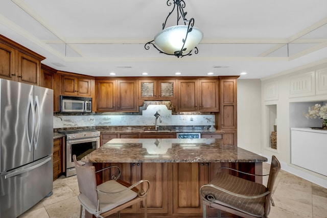 381 E View Dr, Chattanooga, TN 37404 - kitchen featuring stainless steel appliances, backsplash, a breakfast bar, a kitchen island, and recessed lighting
