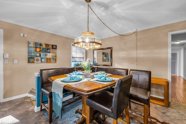 6434 Waconda Point Rd, Harrison, TN 37341 - dining room with baseboards, an inviting chandelier, and crown molding