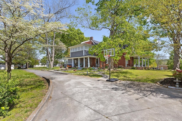 302 S Main St, Lafayette, GA 30728 - view of front of home featuring a chimney, driveway, and a front yard