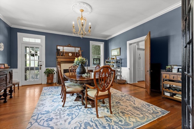 302 S Main St, Lafayette, GA 30728 - dining area featuring hardwood / wood-style flooring, an inviting chandelier, and ornamental molding