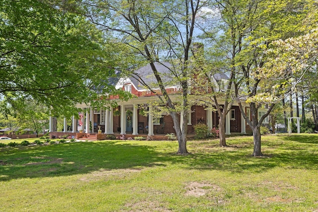 302 S Main St, Lafayette, GA 30728 - view of front of property featuring covered porch, brick siding, and a front yard