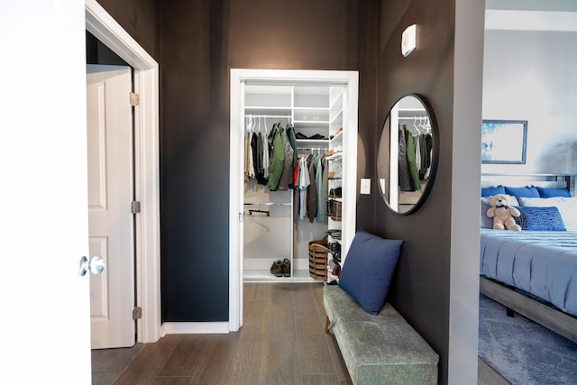 hallway with wood finished floors