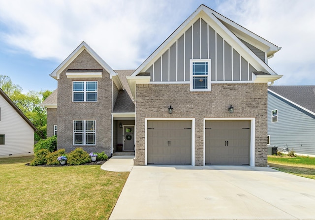 craftsman-style home with board and batten siding, driveway, brick siding, and a front yard