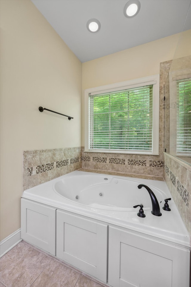 7415 Island Manor Dr, Harrison, TN 37341 - full bathroom with a tub with jets and tile patterned floors