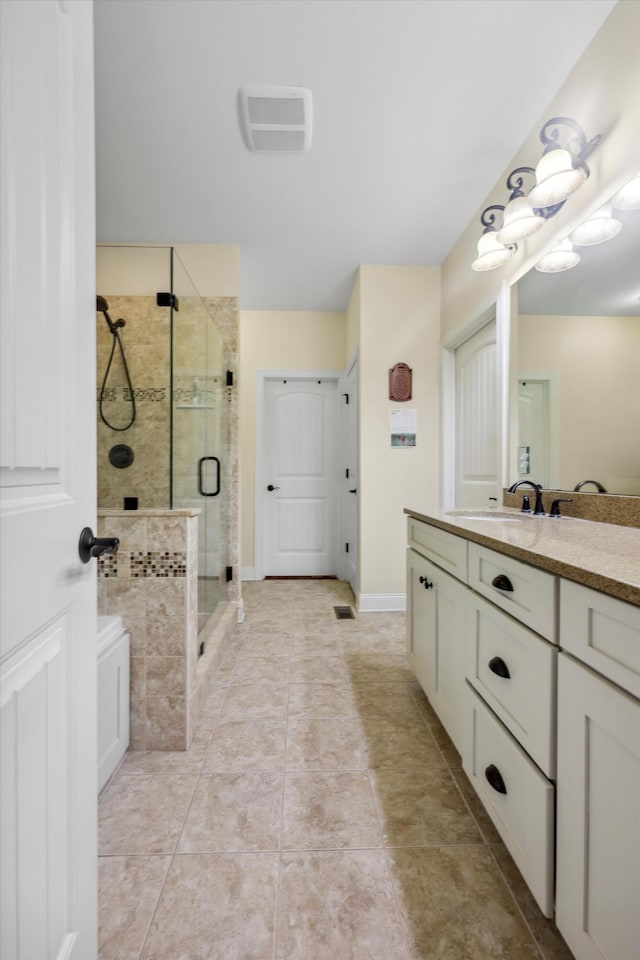 7415 Island Manor Dr, Harrison, TN 37341 - full bath with a stall shower, vanity, and tile patterned floors