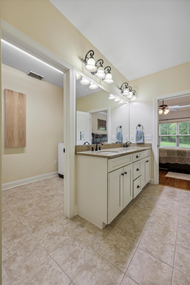 7415 Island Manor Dr, Harrison, TN 37341 - ensuite bathroom with double vanity, ceiling fan, and tile patterned flooring
