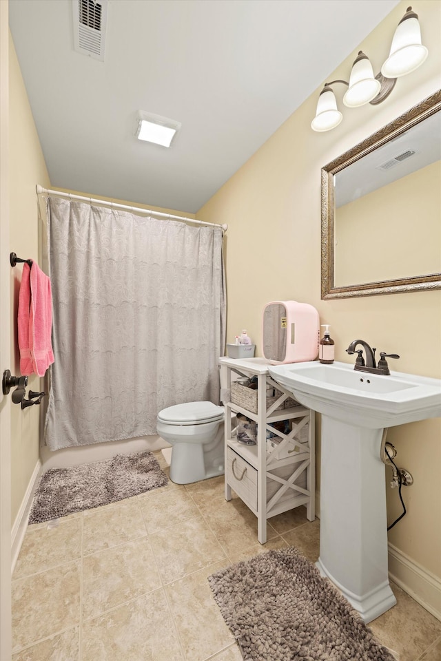 7415 Island Manor Dr, Harrison, TN 37341 - full bathroom with toilet, curtained shower, tile patterned flooring, and a sink