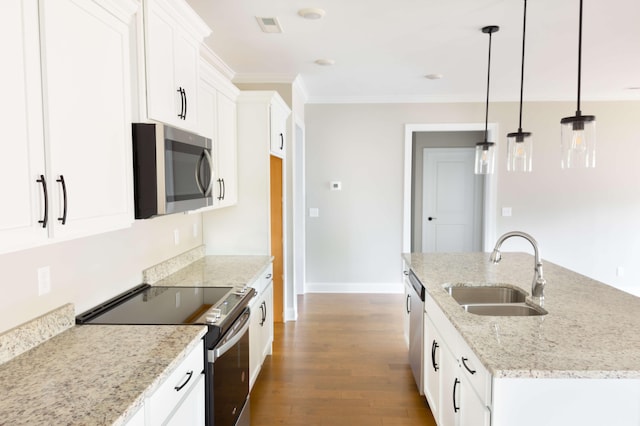 kitchen with white cabinetry, ornamental molding, appliances with stainless steel finishes, a sink, and dark wood-style floors