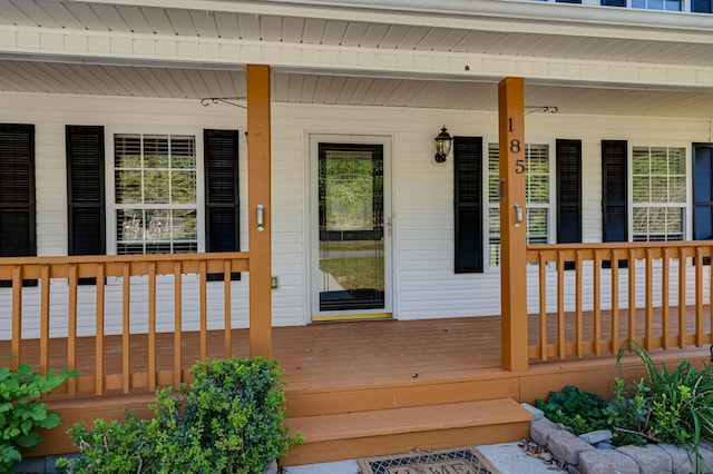 doorway to property featuring a porch