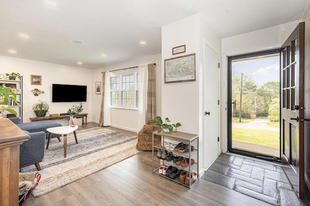 foyer entrance featuring recessed lighting and wood finished floors